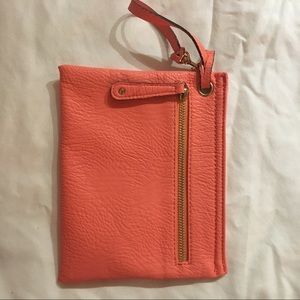 Salmon colored wristlet